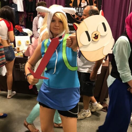 Cosplayer modelling our Cake Shield and Fionna Crystal Sword
