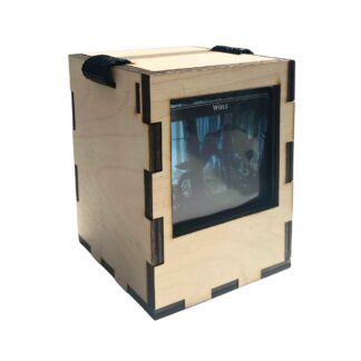 Commander deck box with clear display window and Magic: The Gathering cards inside
