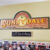 Sunnydale Sign Proudly Shown on Customer Wall