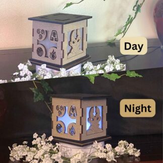 Avatar Wooden 5" Light Up Gift Box that is cut through on two sides with colored filter to light up as it gets dark.