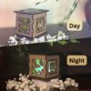 Gardening Wooden 5" Light Up Gift Box that is cut through on two sides with colored filter to light up as it gets dark.