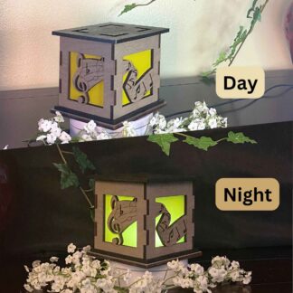 Music Wooden 5" Light Up Gift Box that is cut through on two sides with colored filter to light up as it gets dark.