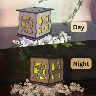 Pokemon Wooden 5" Light Up Gift Box that is cut through on two sides with colored filter to light up as it gets dark.