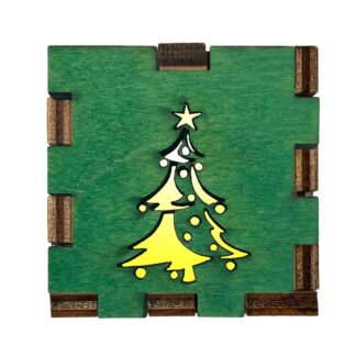 Interactive wooden light box with green-stained Christmas tree front, glowing with yellow filter light.