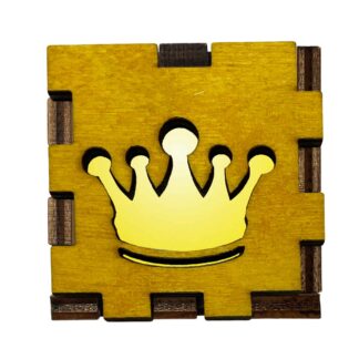 Yellow-stained wooden light box with a glowing crown cutout design