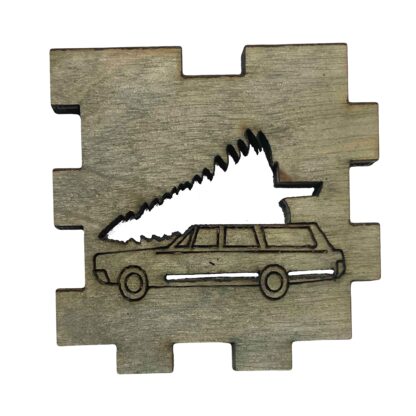 Grey-stained wooden front featuring laser-cut station wagon and oversized Christmas tree from Christmas Vacation movie