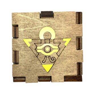 Yu-Gi-Oh! Millennium Puzzle Light Box with gold-stained wood front and glowing yellow filter inside